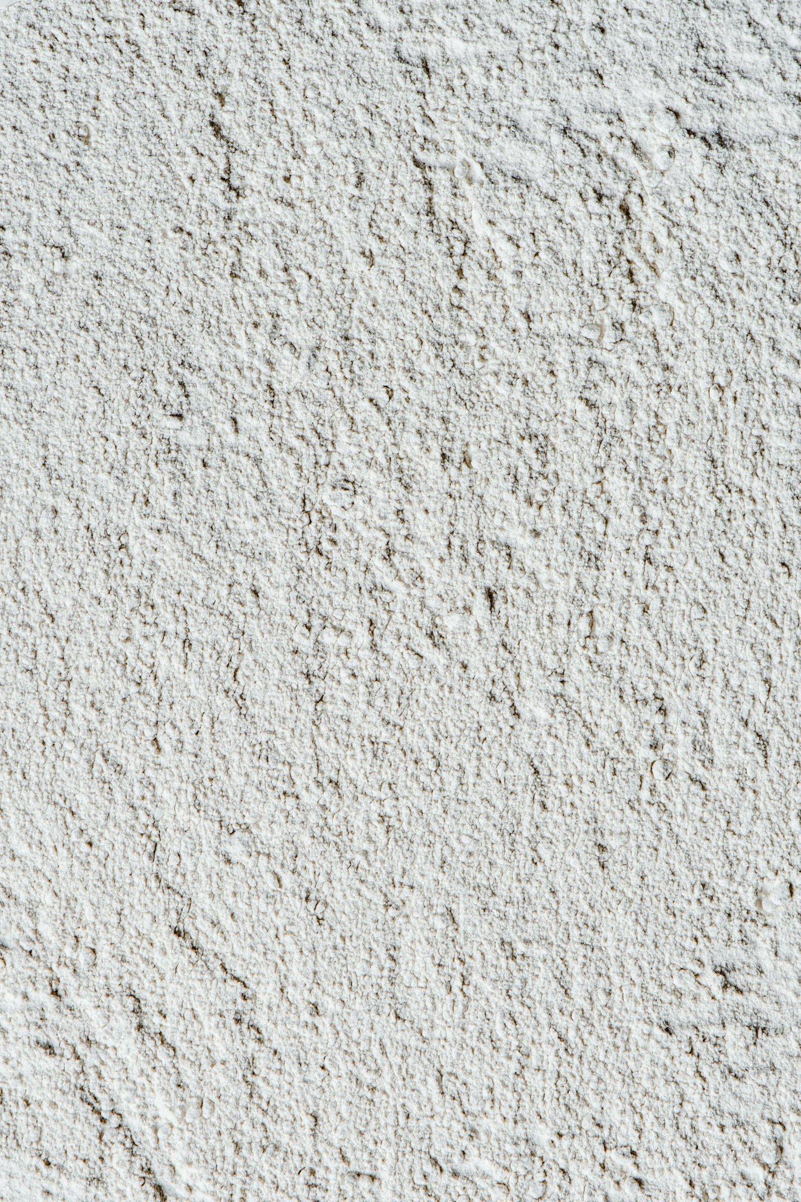 Close-up of a textured kaolin clay surface showcasing natural patterns.